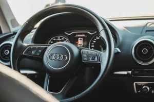 Close-up of an audi car interior, specifically the wheel